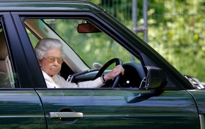 Queen Elizabeth driving her Range Rover.