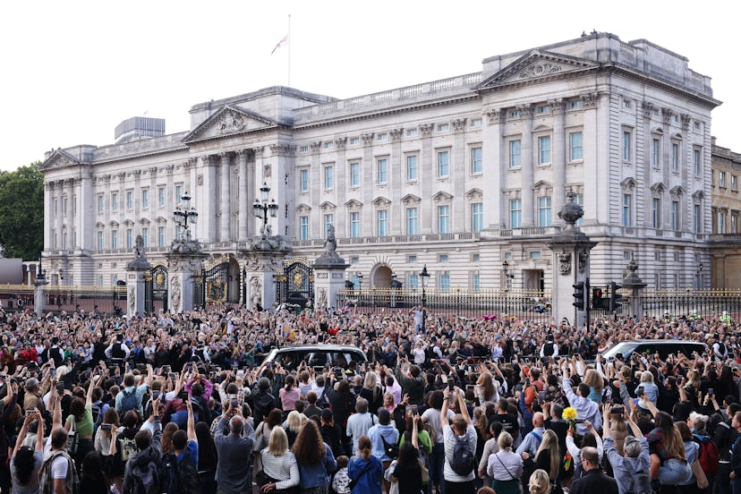 Crowds gather outside of Buckingham Palace to greet King Charles III and Camilla, Queen Consort. 