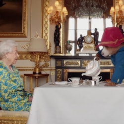 Queen Elizabeth II and Paddington Bear share tea at Buckingham Palace during the Platinum Jubilee We...