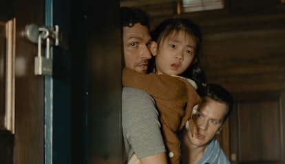 Jonathan Groff (right), Ben Aldridge (left), and Kristen Cui (center) in Knock at the Cabin.