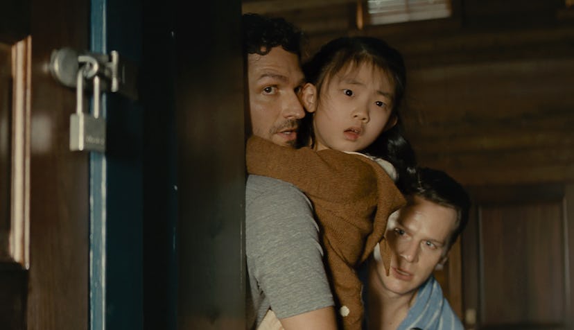 Jonathan Groff (right), Ben Aldridge (left), and Kristen Cui (center) in Knock at the Cabin.