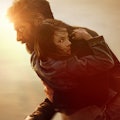 Wolverine (Hugh Jackman) carries Laura (Dafne Keen) on a poster for 2017's Logan
