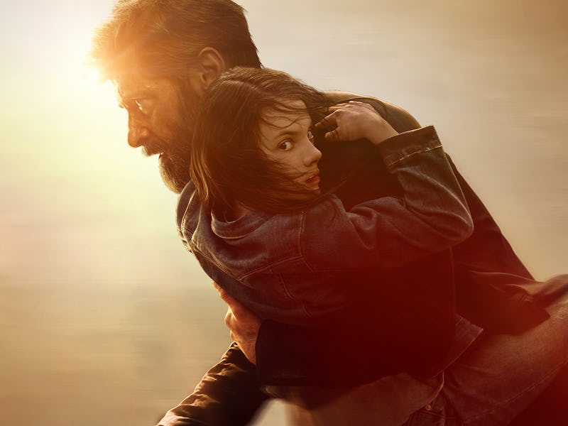 Wolverine (Hugh Jackman) carries Laura (Dafne Keen) on a poster for 2017's Logan