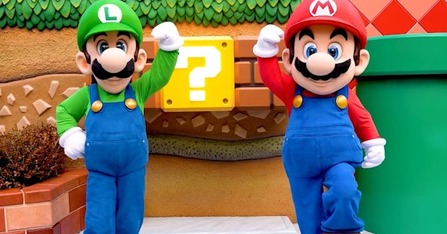 Luigi and Mario greet guests at  Super Nintendo World at Universal Studios Hollywood. See photos of ...