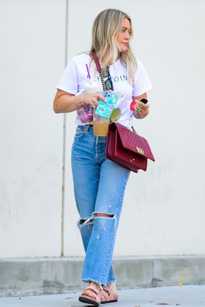 Hilary Duff is seen carrying a red chanel boy bag on July 23, 2022 in Los Angeles