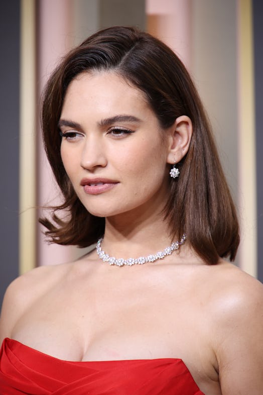 Lily James attends the 80th Annual Golden Globe Awards 