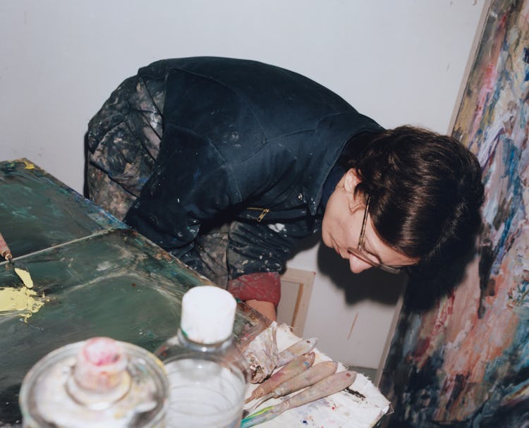 Francesca looking for materials in her studio in London