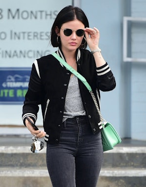 Lucy Hale is seen carrying a green chanel boy bag in los angeles