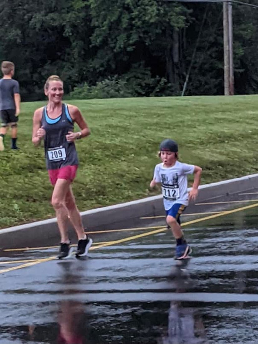 Shannon running a 5K with her son.