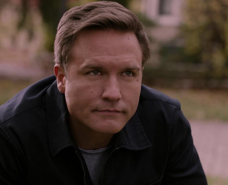 Paul, a Capricorn, played by Scott Porter, looks ahead with a serious expression during Ginny & Geor...