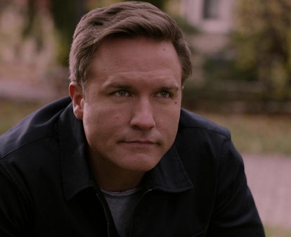 Paul, a Capricorn, played by Scott Porter, looks ahead with a serious expression during Ginny & Geor...