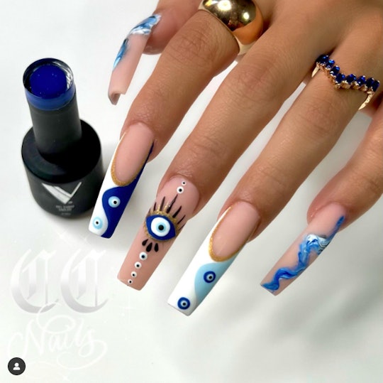 Friday the 13th nail designs with blue evil eyes