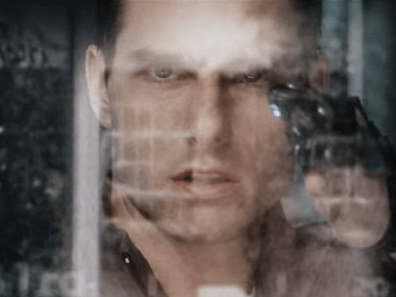 Tom Cruise's character surrounded by sci-fi tech