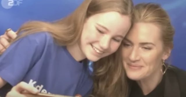 Kate Winslet goes into mom mode to try and ease the nerves of a young interviewer working for German...