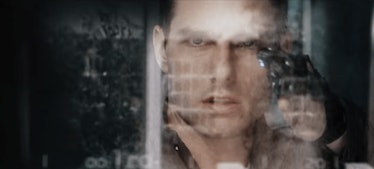 Tom Cruise's character combs through data on a digital touchscreen