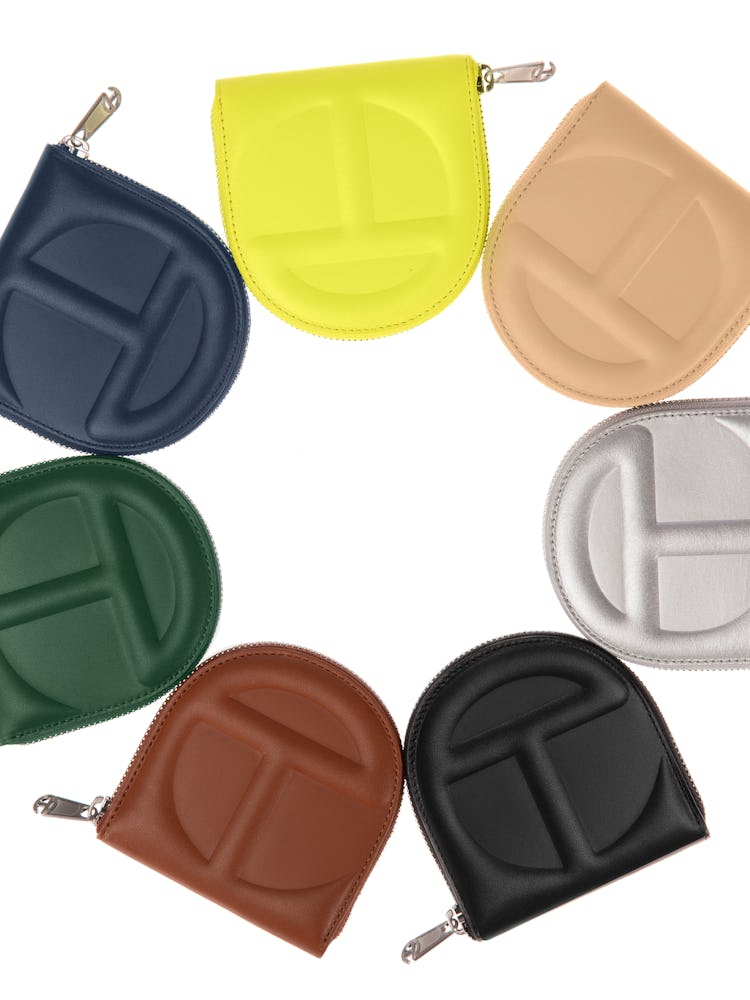 a circle of Telfar wallets in different colors
