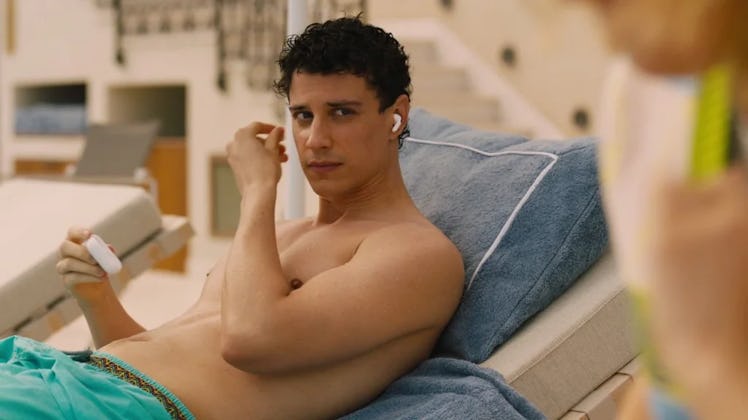Albie, whose zodiac sign is Cancer, played by Adam DiMarco sits by the pool in The White Lotus