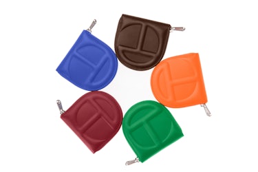 a circle of Telfar wallets in different colors