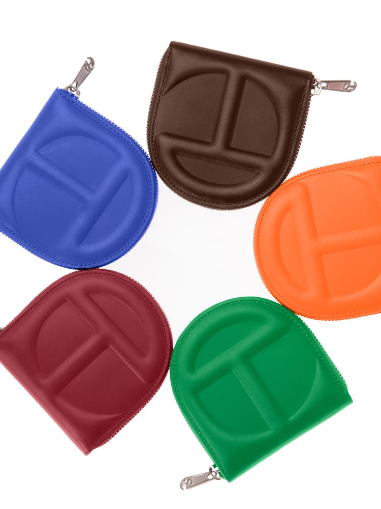 a circle of Telfar wallets in different colors