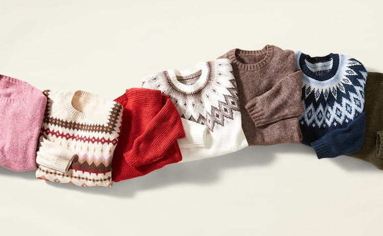 6 stylish sweaters to wear this fall in different colors folded next to each other