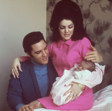 Elvis and Priscilla Presley with their four-day-old daughter, Lisa Marie. 