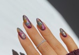 Try holographic glitter nail art for Aquarius season.