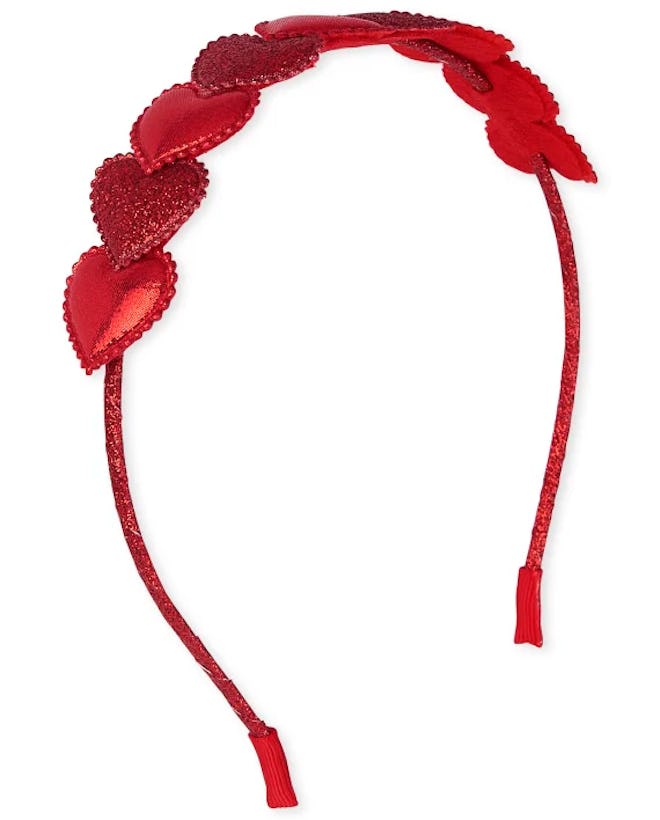 Red heart headband in a story about Valentine's Day outfits for girls