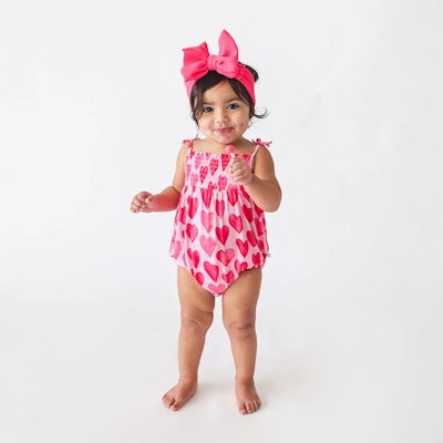 Heart romper, perfect for parents in search of cute Valentine's Day outfits for girls