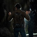 Joel Miller (Pedro Pascal) stands in front of a FEDRA Agent at the end of The Last of Us Episode 1