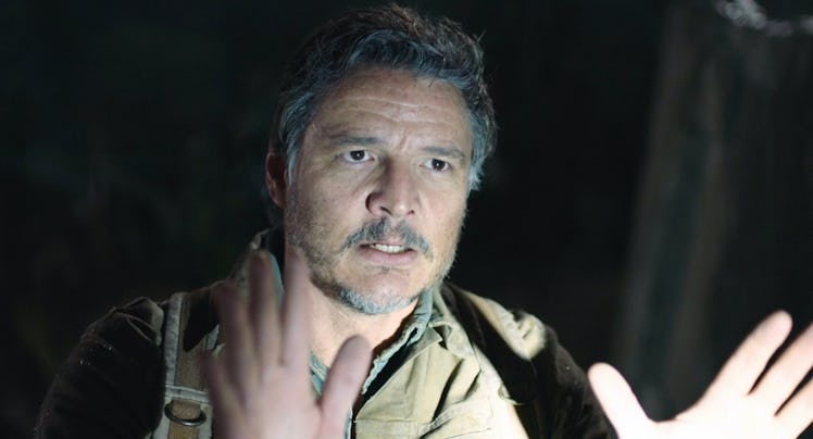 Pedro Pascal holds up his hands as Joel in The Last of Us Episode 1