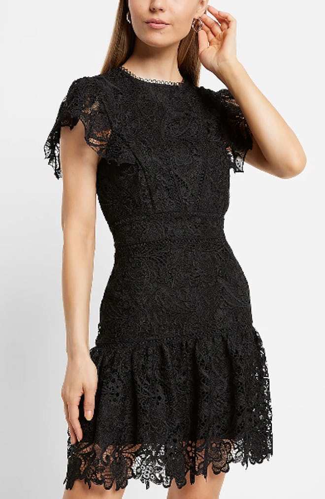 One Valentine's Day outfit idea is this Lace Flutter Sleeve Mini Dress in Pitch Black.