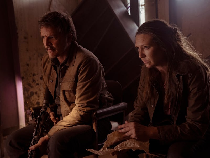 Joel (Pedro Pascal) sits with Tess (Anna Torv) in The Last of Us Episode 2