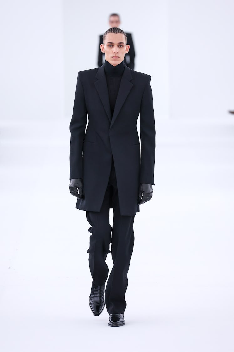 A model walks the runway during the Givenchy Menswear Fall-Winter 2023-2024 show as part of Paris Fa...