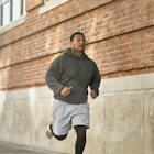 A man jogging down a street