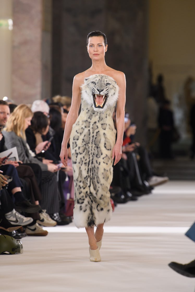 shalom harlow wearing a tiger's head on the schiaparelli couture runway