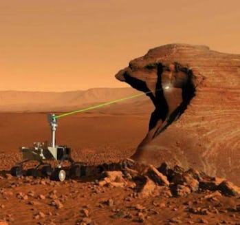 This artist's illustration shows MSL Curiosity firing its ChemCam laser at a rocky outcrop.  If M...