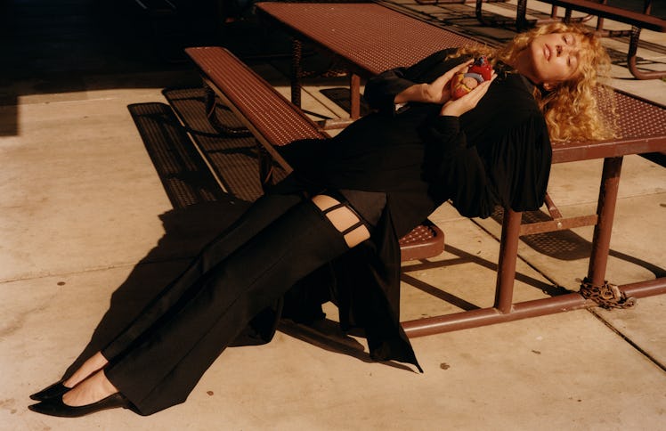 Raquel Zimmermann wears a Gucci dress, jacket, shorts, and pants; the Row shoes.