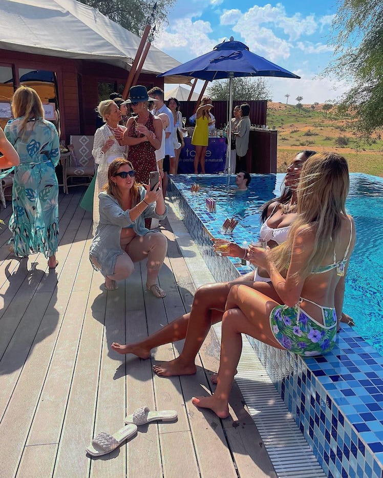 Monet McMichael and other influencers enjoy a pool party as part of Tarte's Dubai influencer trip, w...