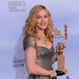 Madonna with a Golden Globe award.