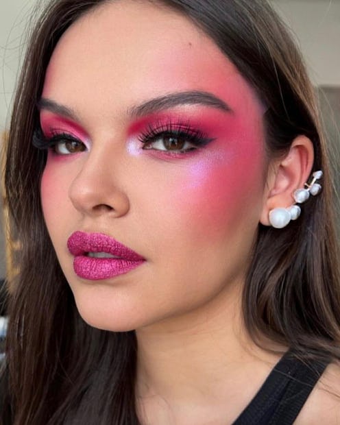 Valentine's Day makeup in 2023 is all about bold, sexy pops of pink blush and eyeshadow.
