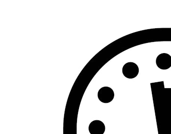 black and white drawing of a simple clock face with its minute hand approaching midnight.