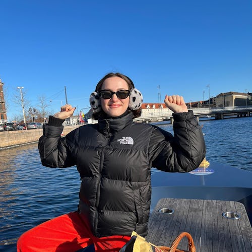 Maude Apatow wearing a black The North Face puffer jacket