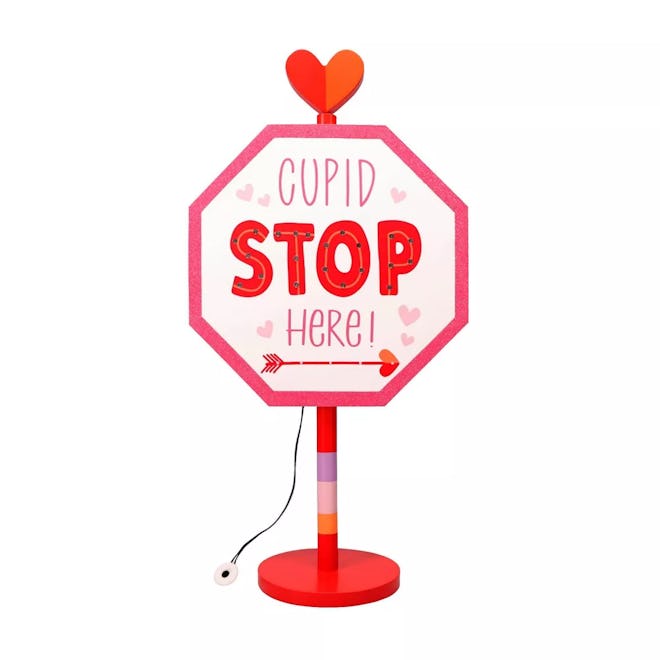 Cupid stop here sign, a cute Valentine's Day decor for kids room