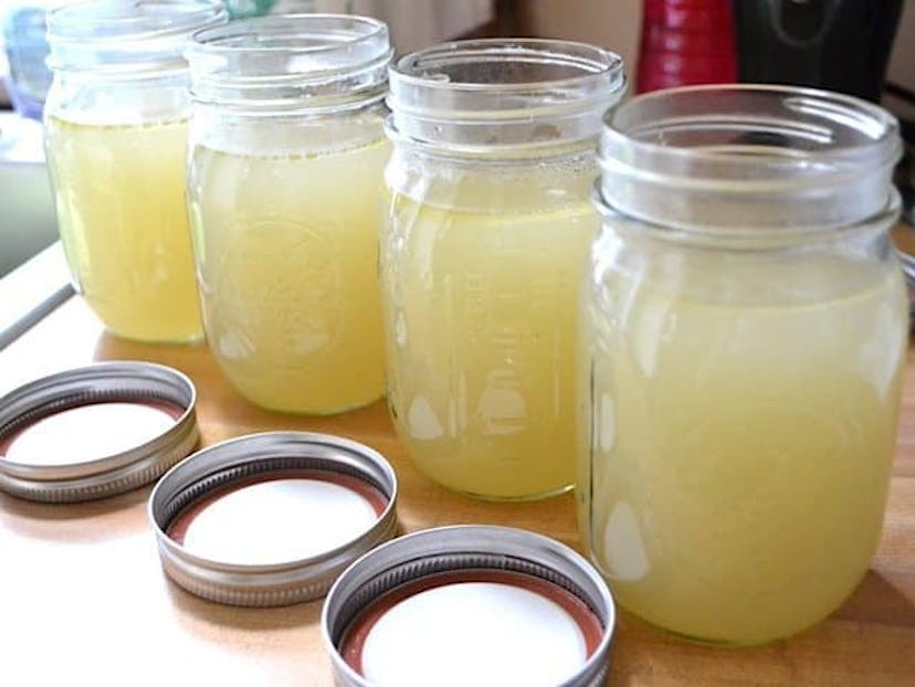 Homemade bone broth in jars, a perfect sick kid recipe for rehydration
