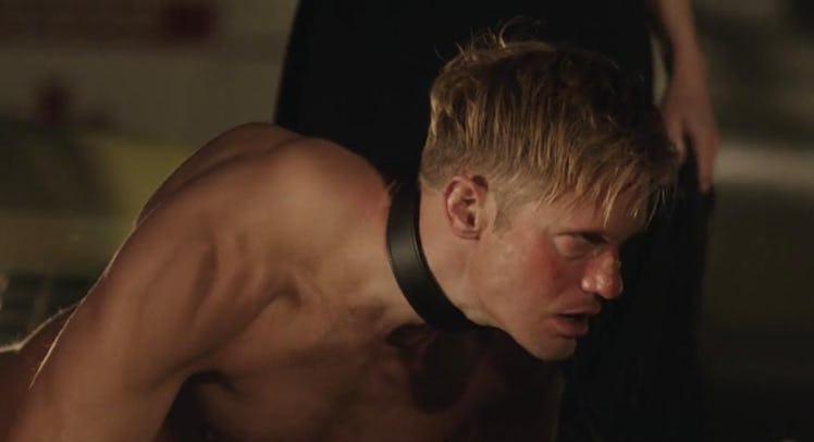 Alexander Skarsgard shirtless in a leash. 