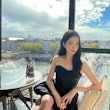 BLACKPINK's Jisoo Paris cafe with fishnets and dior purse