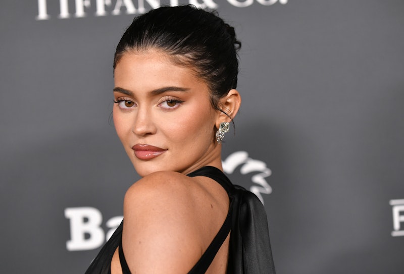 Kylie Jenner Hits Paris Fashion Week in Bondage-Style Black Dress