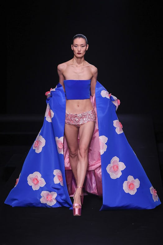 A model walks the runway during the Valentino Haute Couture Spring Sum