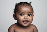 portrait of beautiful black baby girl for article on girls names that start with z