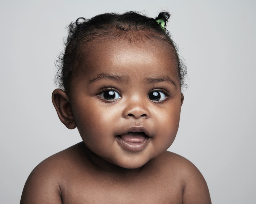 portrait of beautiful black baby girl for article on girls names that start with z